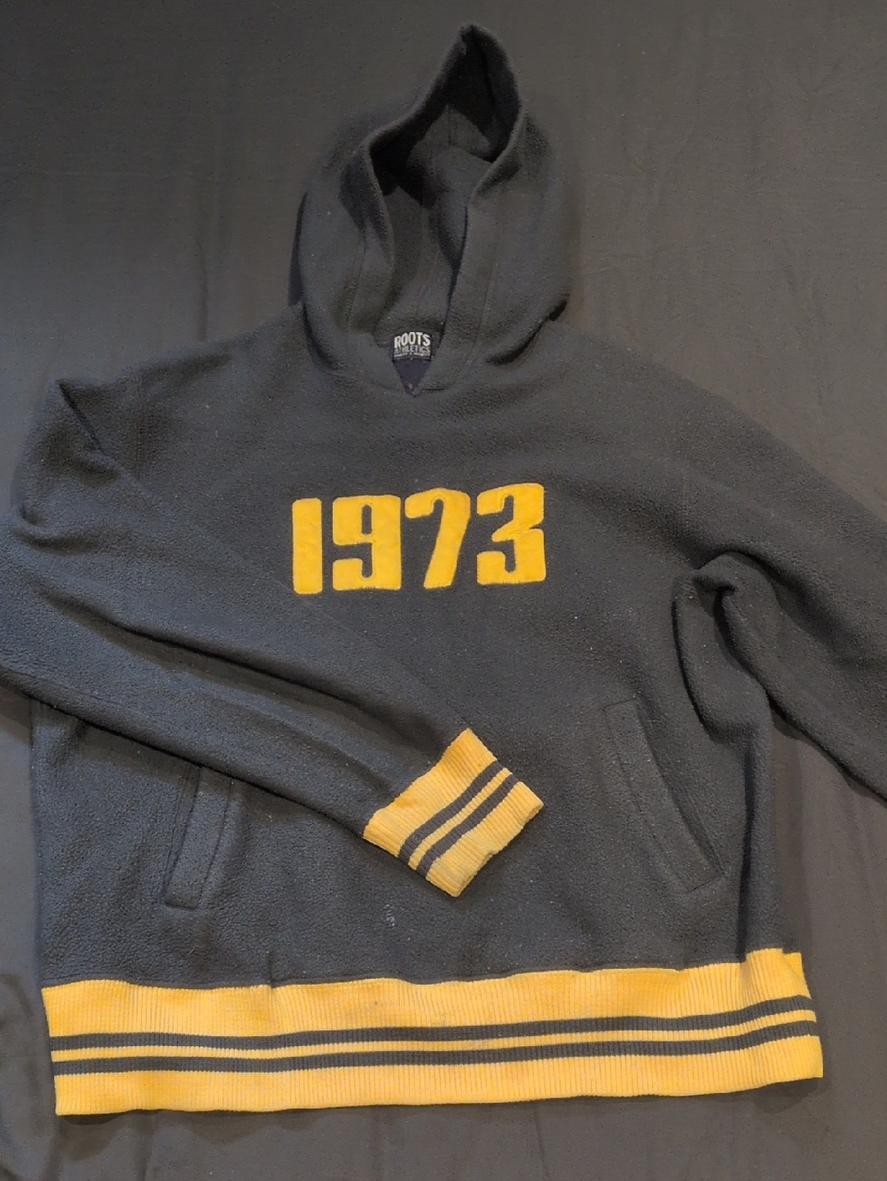 Roots Black Hoodie with Yellow 1973 Applique